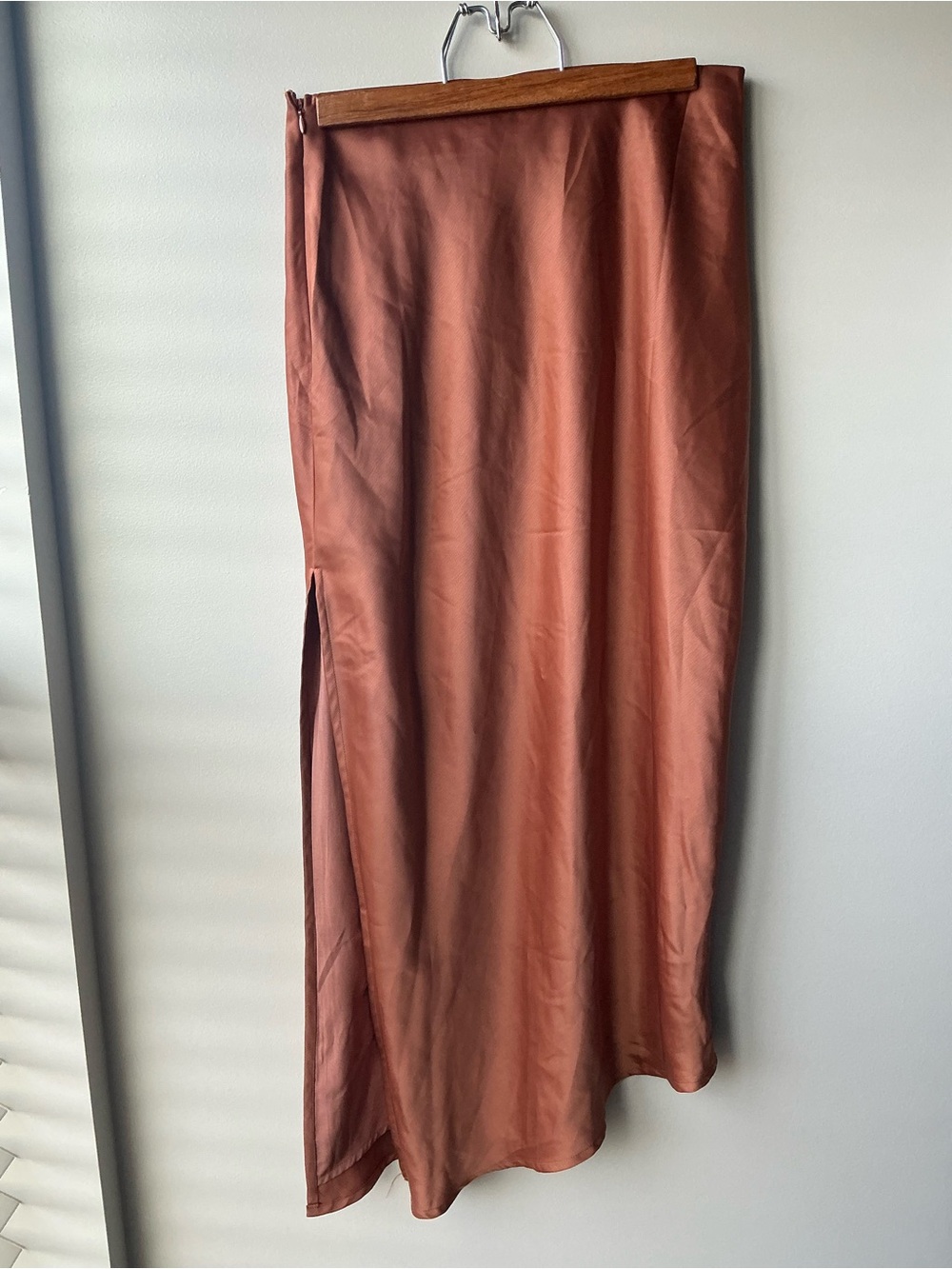 Silky orange midi skirt with slit